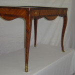 A Louis XV tric-trac table after side view